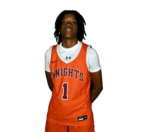 Young woman in orange-on-white basketball uniform with Knights and No. 1 on the jersey front