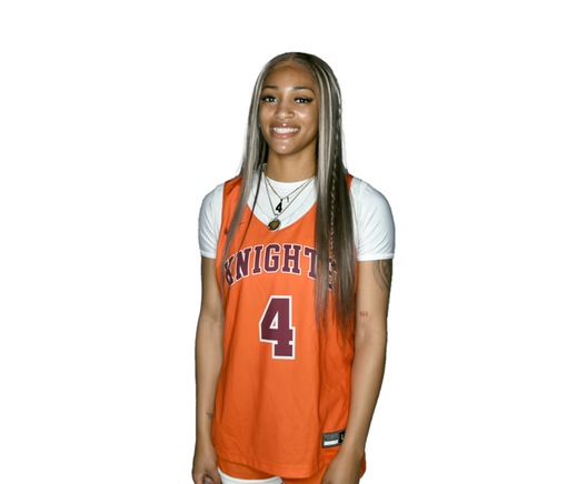 Young woman in an orange-on-white basketball uniform with Knights and 4 on the jersey front