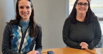 Margaret Schachte, left, and Cassandra Dwyer at a recent college librarians' meeting.