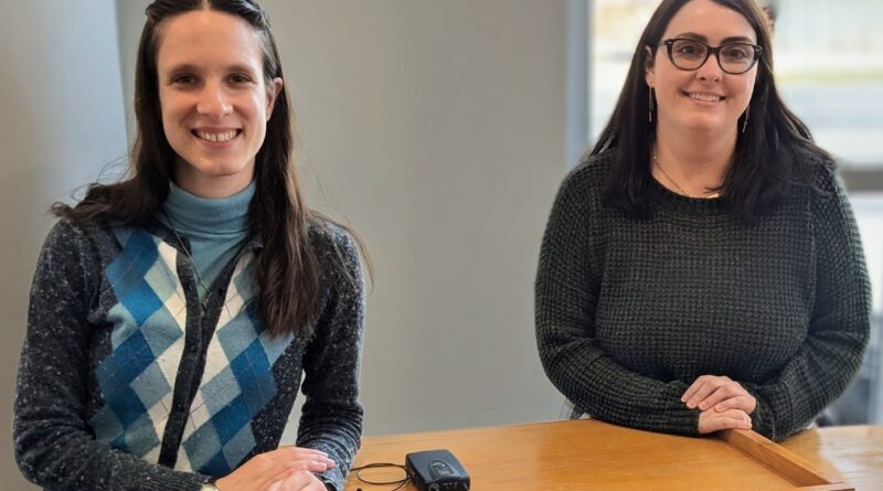 Margaret Schachte, left, and Cassandra Dwyer at a recent college librarians' meeting.