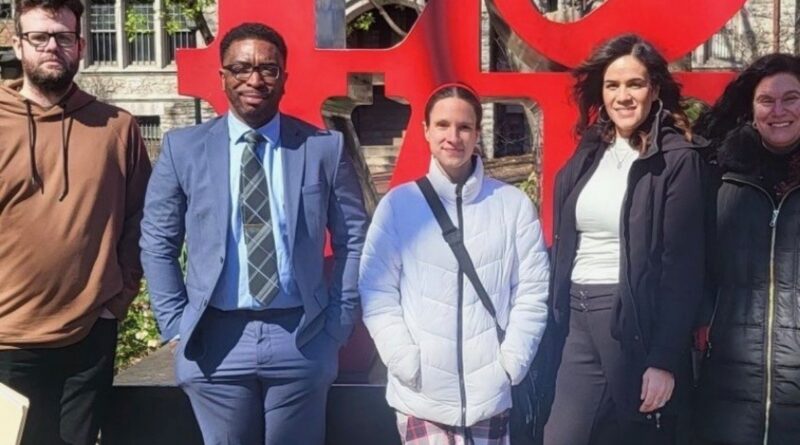 Five people from Central Penn College in front of the Love statue in Center City Philadelphia, where they attended a mock-trial competiton at the University of Pennsylvania and which they helped to jiudge.