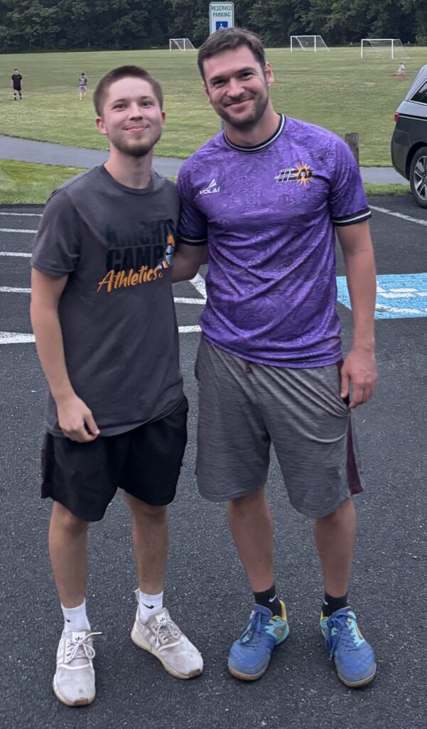 Knightly News reporter Brandon Drumheller, left, in a gray Central Penn Knights Athletics Department T-shirt, and Harrisburg Heat soccer team defender Thomas Hogue on right, in a purple Heat jersey,